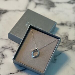 Zales sterling  silver and diamond pendant.